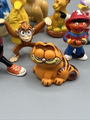 Lot 14 Vintage Character Figurines Sesame Street Disney Garfield Raisin PVC Toys