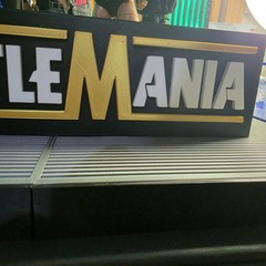 WWE Mattel Large 12 X 3 White/Gold WrestleMania Logo Accessory