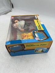 Mezco Family Guy the Giant Chicken vs Peter Figure Set Sealed. Box is damaged.