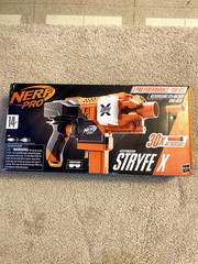 Nerf Pro Stryfe X Dart Blaster: Battery, 30 HL Darts, Magazine, Glass & Charger.