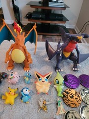 Pokémon Mixed Lot Of Figures, Coins, Pins, Tops Trading Cards