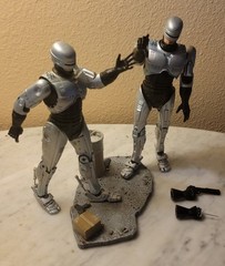Lot Of 2 NECA RoboCop: Spring-Loaded Holster & Stiff-Hip 2011 Action Figures 7″
