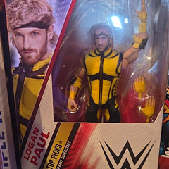 WWE Top Picks Logan Paul Action Figure Yellow/Black Outfit w/ Alternate Hands