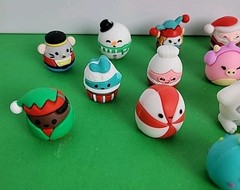 23 Mini Rubberized Squishmallows Toys.