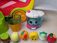 Shopkins Smoothie Truck with Figures and Shoppie Donatina World Vacation Doll