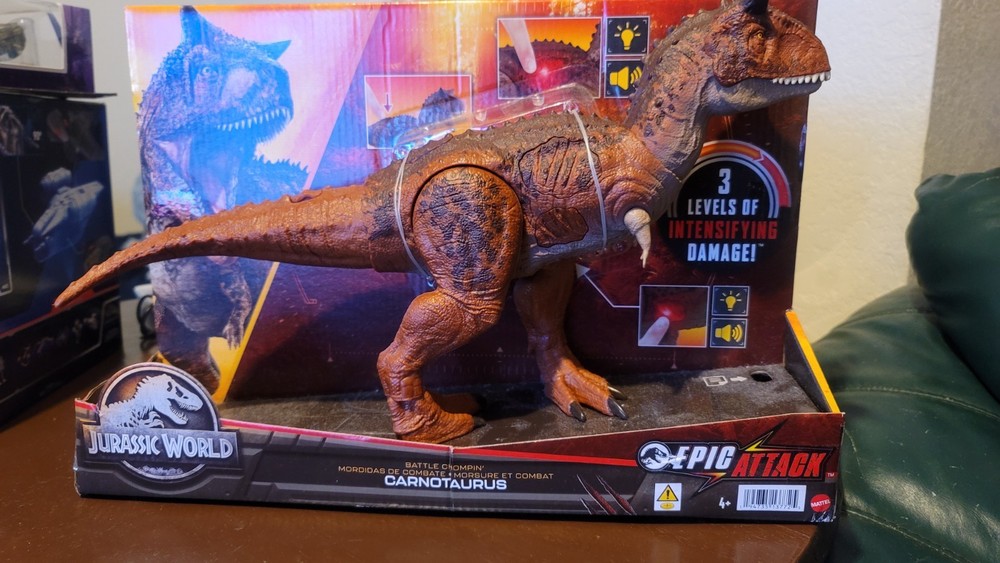 Jurassic World Epic Attack: Carnotaurus Dinosaur Figure never been opened.