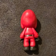 YuMe Piggy Bank Squid Games Mystery Capsule Triangle Solder Mini Figure 2.5″