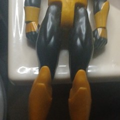 Yellow & Black Plastic Action Figure w/ Green Chest Symbol, Flesh Accents