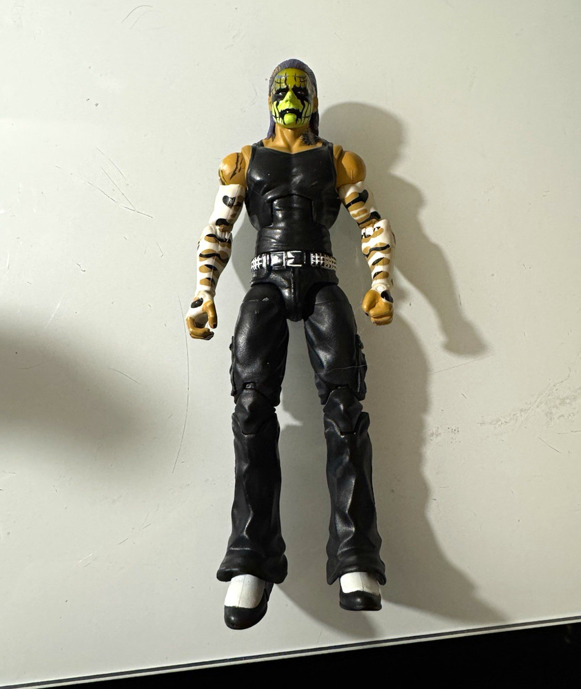 Masked Action Figure Toy – Black & Yellow Outfit, Plastic Figure