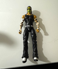 Masked Action Figure Toy – Black & Yellow Outfit, Plastic Figure