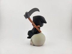 Kawaii Grim Reaper on Skull – Cute Spooky Desktop Decor