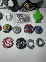 Beyblade Lot – Beyblades, Parts, and Launchers – See Photos & Read Desc
