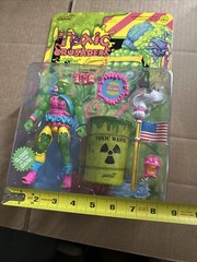 Super7 Toxic Crusaders Toxie Action Figure Glow in Dark w/ Flag Barrel