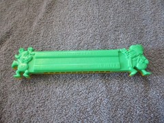 1975 Plastic Green/Yellow Toy Harmonica Have No Fear Underdog Is Here Lednardo