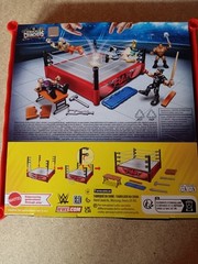 NEW! WWE Knuckle Crunchers Rebound Ring w/ Seth Rollins, The Rock & Roman Reigns