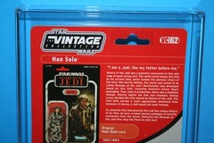 STAR WARS 2011 AFA GRADED MINT ON CARD TVC HAN SOLO TRENCH COAT FIGURE WEAPON