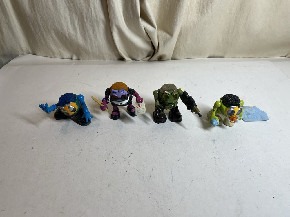 Lot of 4 Uncle Milton’s P-Brains Figurines 2004. Baby, Teacher, Soldier, Skater