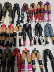 MATTEL WWE LOT OF PARTS, THIS ONE IS LOWER BODIES. LOT C
