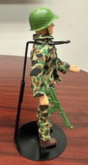 Topper Tiger Machine Gun Mike by Deluxe Reading Toys.