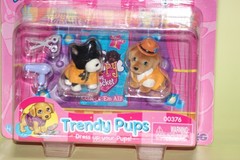 MEG Series 1 Puppy in my Pocket Trendy Pups Dress Up your Pups 4 pc set
