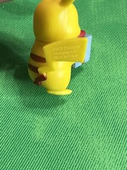 Pikachu Holding A Present Figure 2021 Jawares LLC