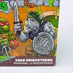 TMNT 1988 Remastered Raphael vs Rocksteady Playmates Action Figure 2-Pack N Hand