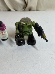 Lot of 4 Uncle Milton’s P-Brains Figurines 2004. Baby, Teacher, Soldier, Skater