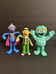 Sesame Street Rosita, Bert, and Super Grover, 7-inch collectible toy features