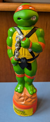 1989 empty 10oz bubble bath plastic bottle Teenage Mutant Ninja Turtles orange