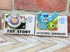 2 MINISO Disney 100 Years of Wonder Retro Stamp Series Monsters Uni & Toy Story