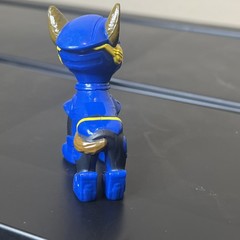 Chase action figure from the Paw Patrol: The Mighty Movie line by Spin Master