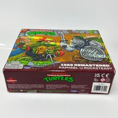 TMNT 1988 Remastered Raphael vs Rocksteady Playmates Action Figure 2-Pack N Hand