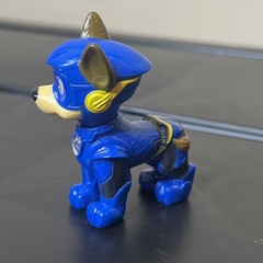 Chase action figure from the Paw Patrol: The Mighty Movie line by Spin Master