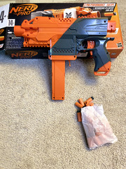 Nerf Pro Stryfe X Dart Blaster: Battery, 30 HL Darts, Magazine, Glass & Charger.