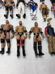 WWE AEW 27+ Action Figures Accessories Lot Undertaker Rock Brett Hart