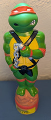 1989 empty 10oz bubble bath plastic bottle Teenage Mutant Ninja Turtles orange