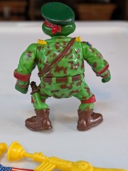 Playmates “Raph, the Green Teen Beret” action figure from the 1991 Near Complete