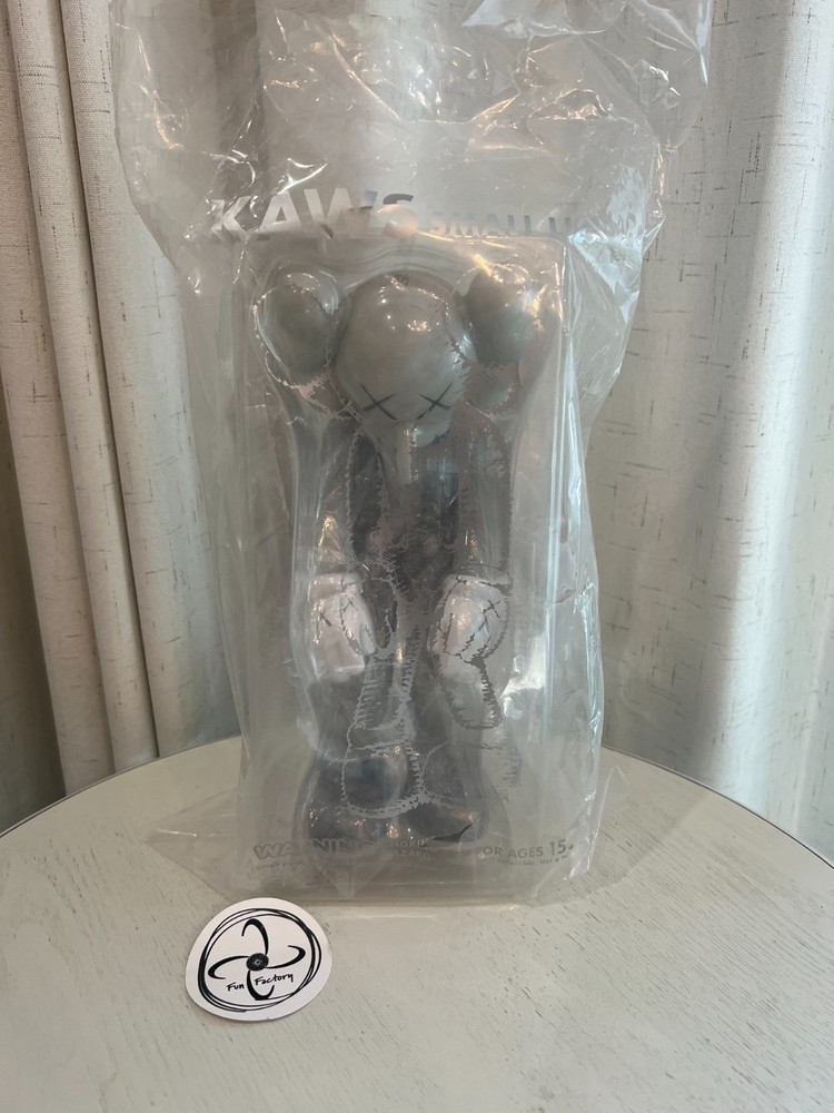 KAWS Small Lie Companion Vinyl Figure Grey