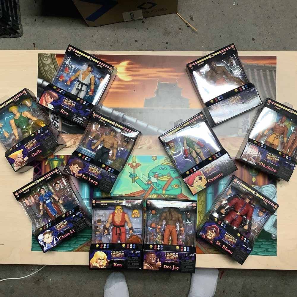 Street Fighter figure lot of 10 Jada and two custom made battle backgrounds