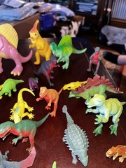 Large Lot of 34 Plastic Resin, Acrylic.-Resin and Rubberl Dinosaur figures.