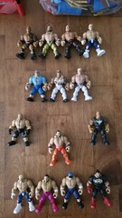 WWE Knuckle Crunchers Action Figures Lot (42) with Ring, Mic, and Accessories