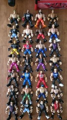 WWE Knuckle Crunchers Action Figures Lot (42) with Ring, Mic, and Accessories