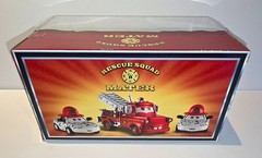 SDCC Disney Cars Rescue Squad Mater (Metallic) with Dalmatian Mia and Tia – NEW