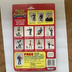 Kenner Police Academy Eugene Tackleberry Boxed Figure w/ Flak Vest & Weapons