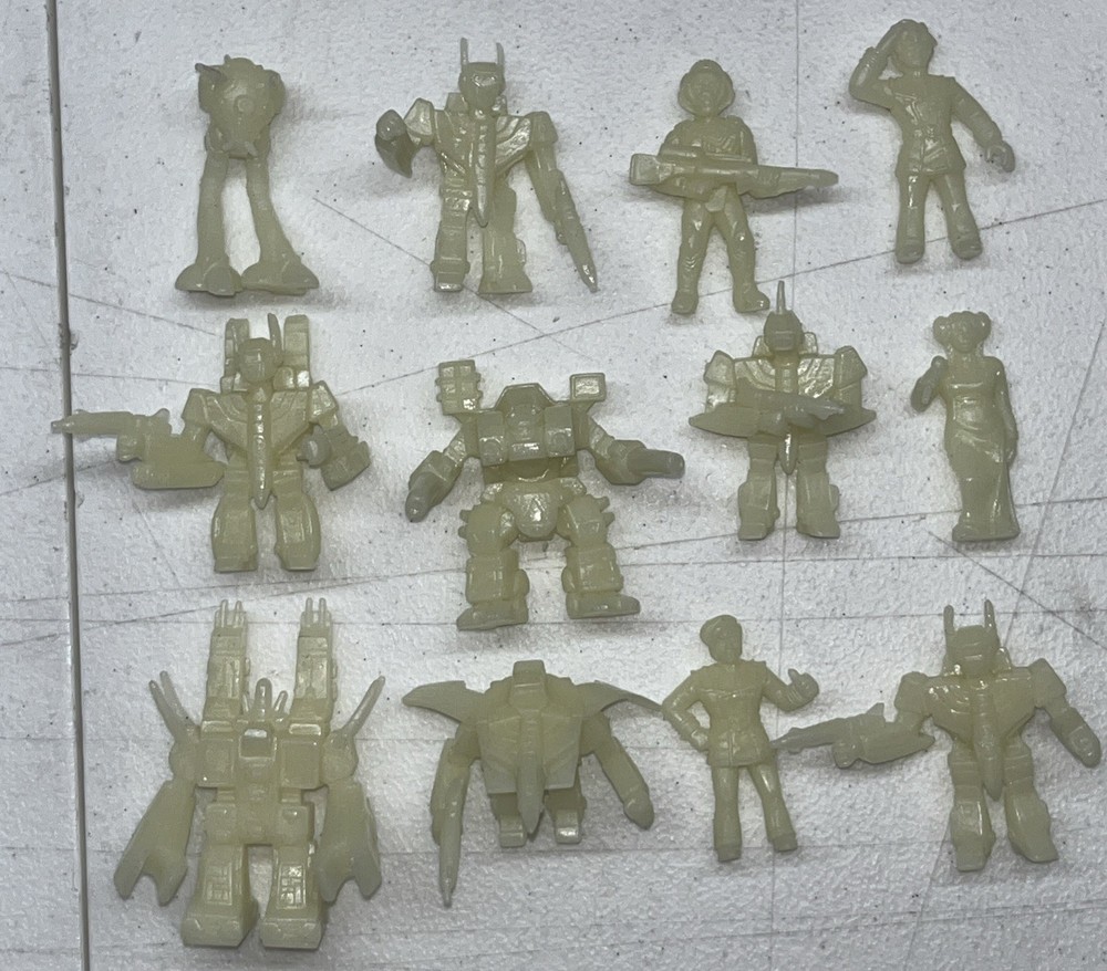 Super 7 robotech M.U.S.C.L.E. trashcan full set of 12 figures in glow 2018