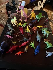Large Lot of 34 Plastic Resin, Acrylic.-Resin and Rubberl Dinosaur figures.