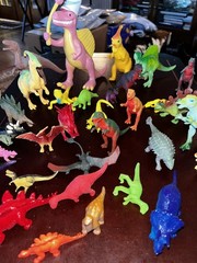 Large Lot of 34 Plastic Resin, Acrylic.-Resin and Rubberl Dinosaur figures.