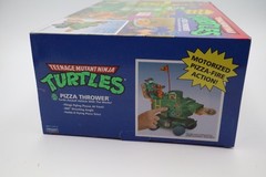 Teenage Mutant Ninja Turtles Pizza Thrower Motorized Pizza-Fire Action NEW