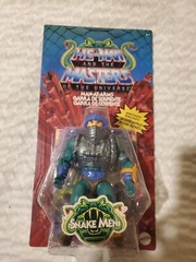 MOT Origins Snake Man at Arms Mexican/Spanish/Portuguese variant card He Man