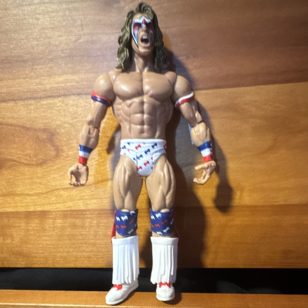 WWE The Ultimate Warrior Action Figure, Face Paint, USA Flag Trunks, Boots